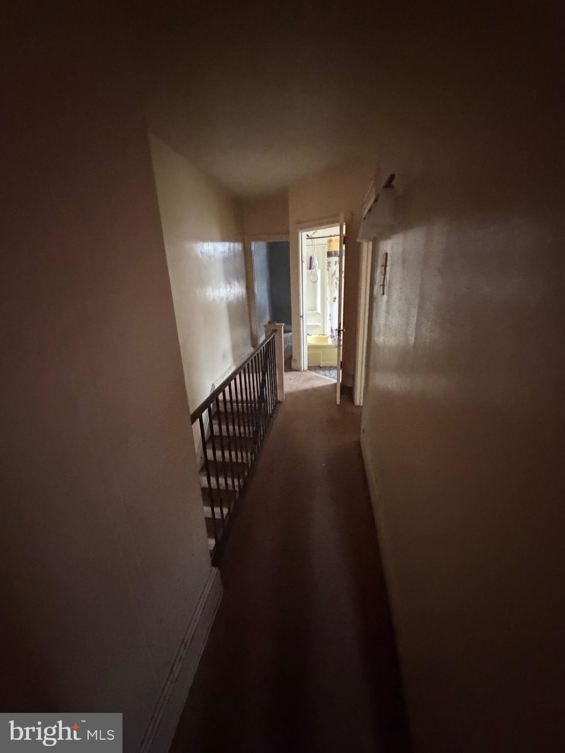 6054 North American Street Philadelphia, PA 19120 - Photo 6 of 10 a view of a hallway with a window