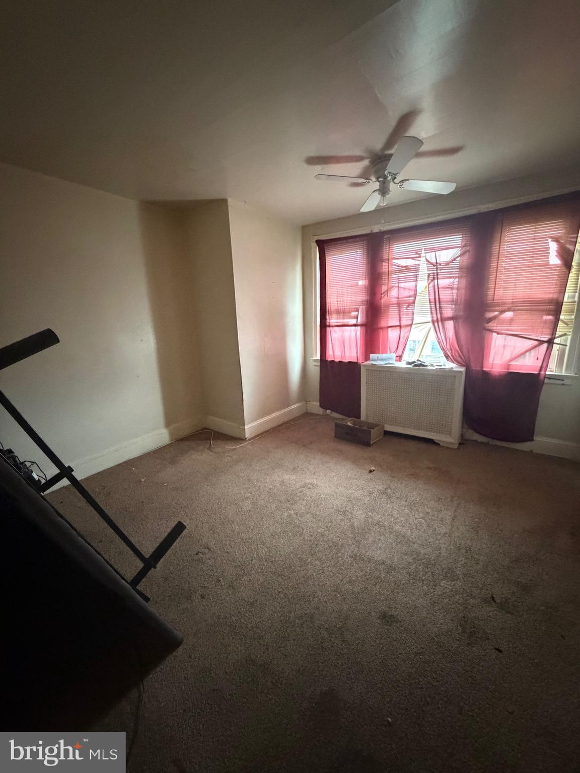 6054 North American Street Philadelphia, PA 19120 - Photo 9 of 10 a living room with furniture and a window