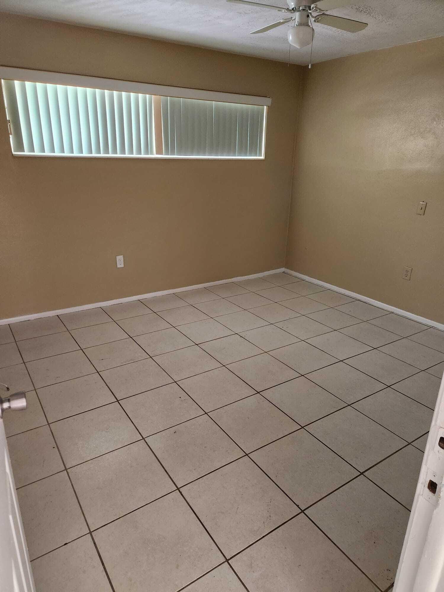 8030 Sunset Strip Sunrise, FL 33322 - Photo 6 of 8 a view of a livingroom and window