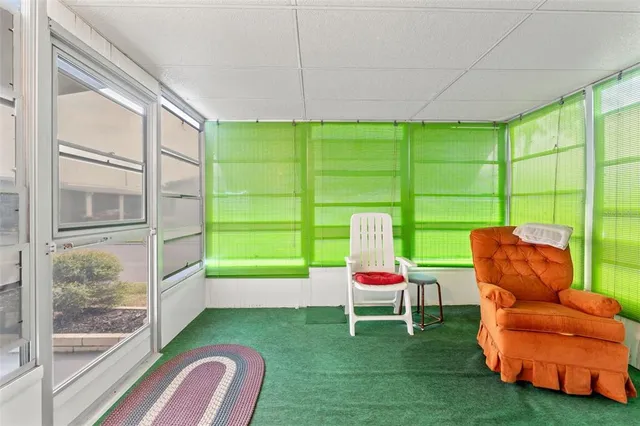 a room with furniture and a window