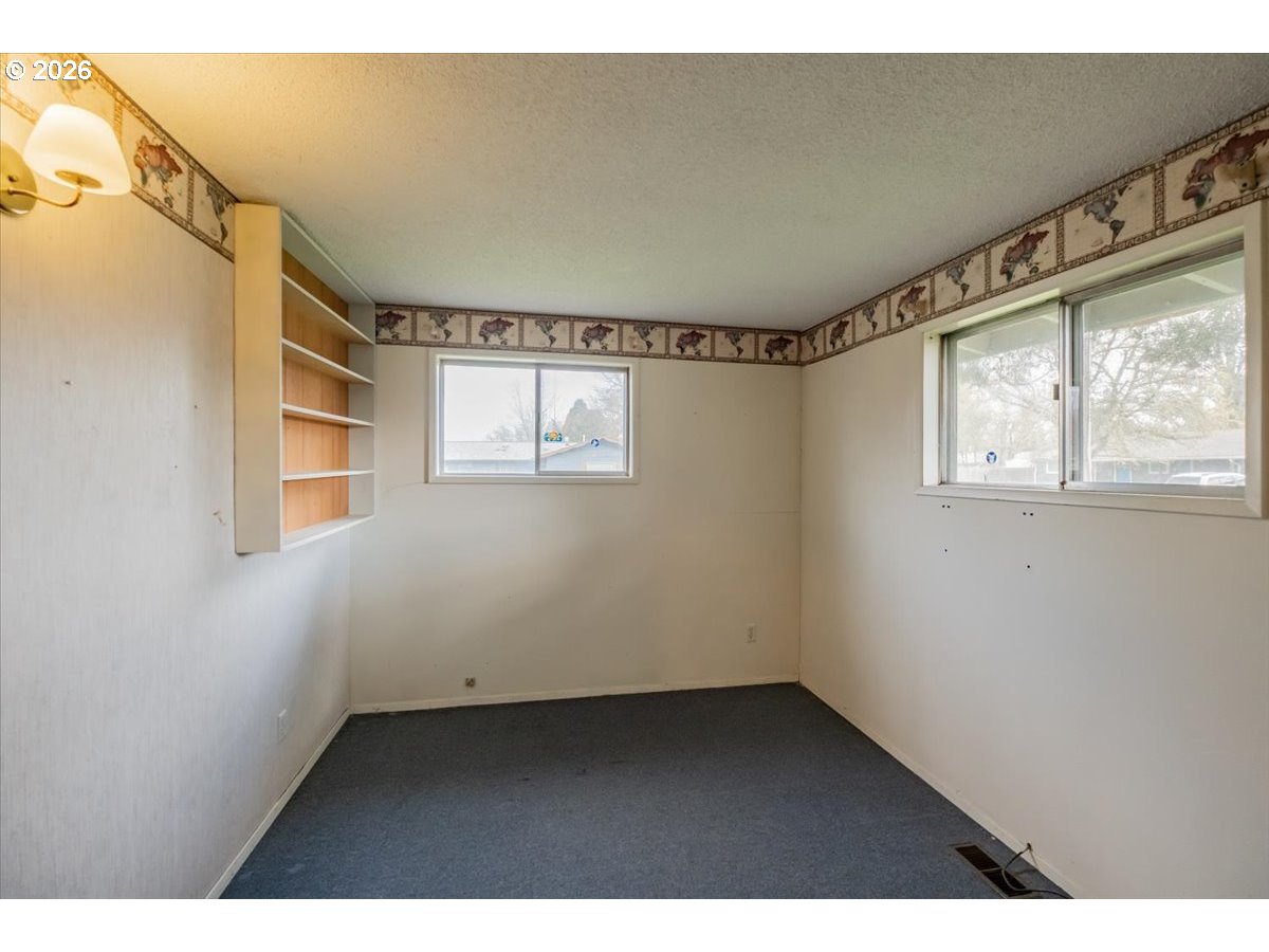 341 Northeast Cambridge Circle Corvallis, OR 97330 - Photo 15 of 46 a view of an empty room with a window
