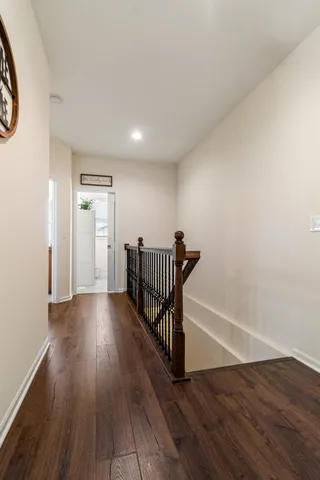 a view of entryway with wooden floor