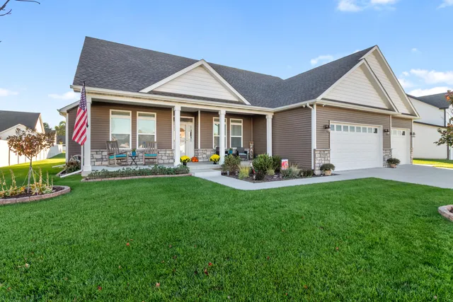 a black and white photo of a house