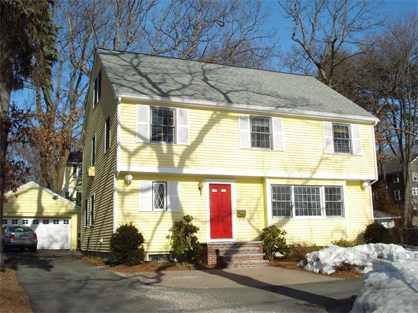 217 Weston Road Wellesley, MA 02482 - Photo 1 of 1 a front view of a house with a yard