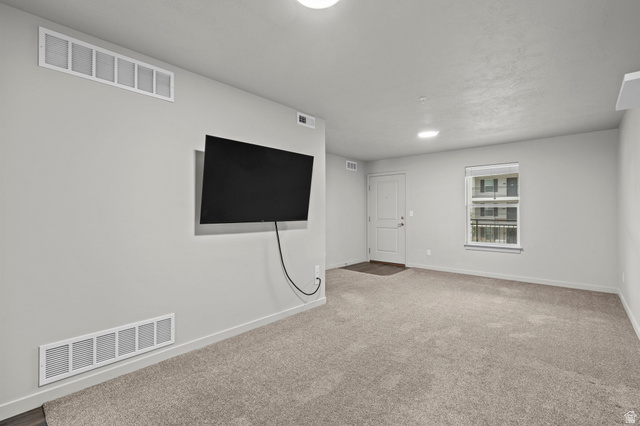 64 West 600 South, Unit C205 Springville, UT 84663 - Photo 8 of 28 Below grade area with carpet and baseboards