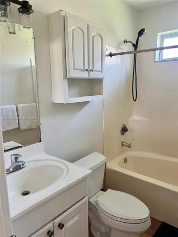 a view of a room and window