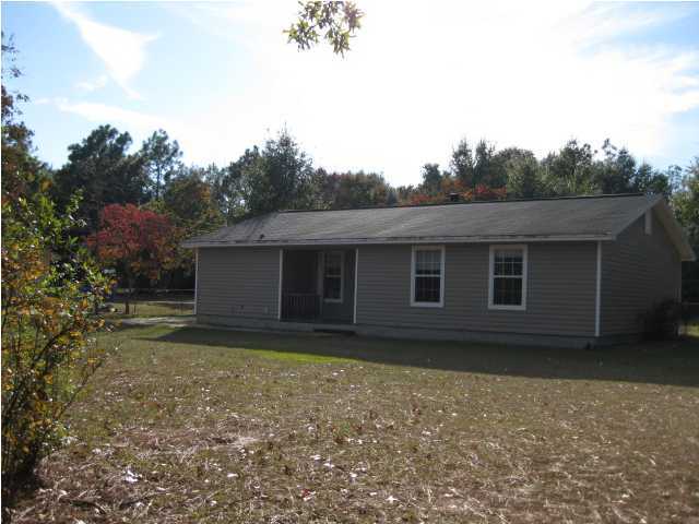6216 Winstead Road Crestview, FL 32539 - Photo 1 of 10 a house view with a backyard space
