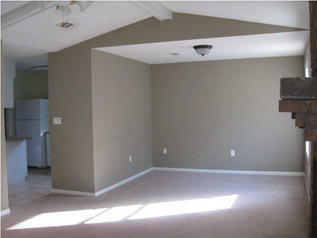 6216 Winstead Road Crestview, FL 32539 - Photo 4 of 10 a view of a room with a refrigerator