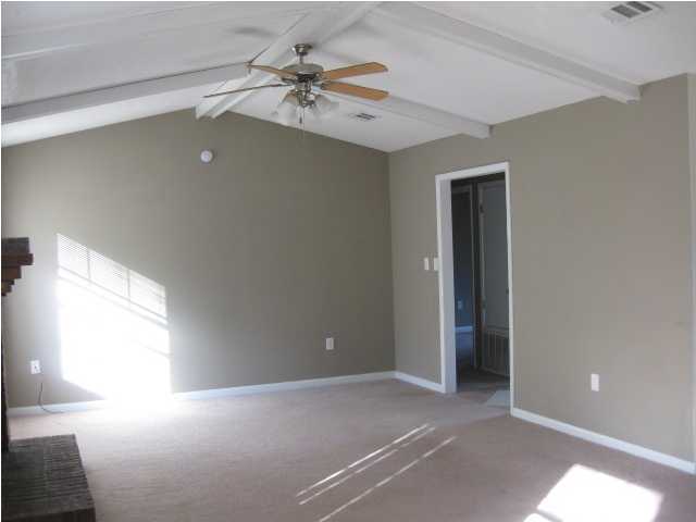 6216 Winstead Road Crestview, FL 32539 - Photo 6 of 10 a view of an empty room with a window
