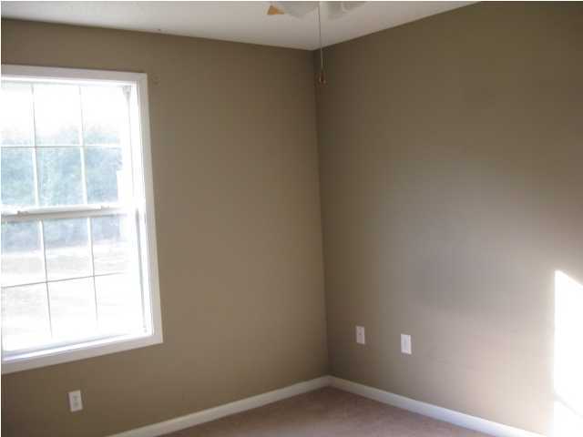 6216 Winstead Road Crestview, FL 32539 - Photo 7 of 10 an empty room with a window