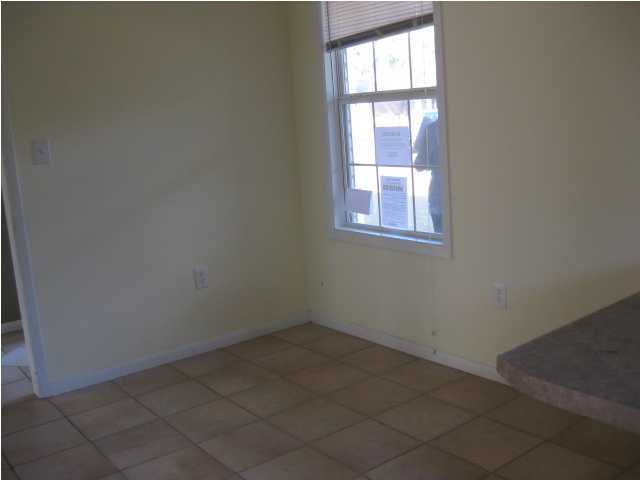 6216 Winstead Road Crestview, FL 32539 - Photo 10 of 10 an empty room with a window