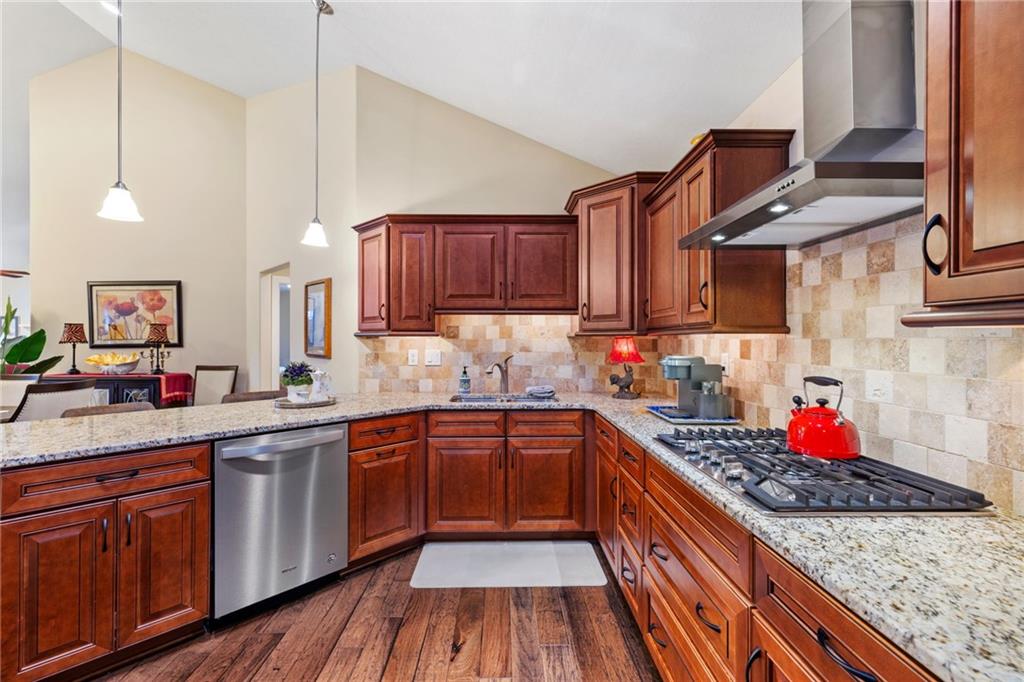 346 Saddlebrook Road Gibsonia, PA 15044 - Photo 13 of 27 upgraded package gas cook top, wall oven, hood and granite countertops