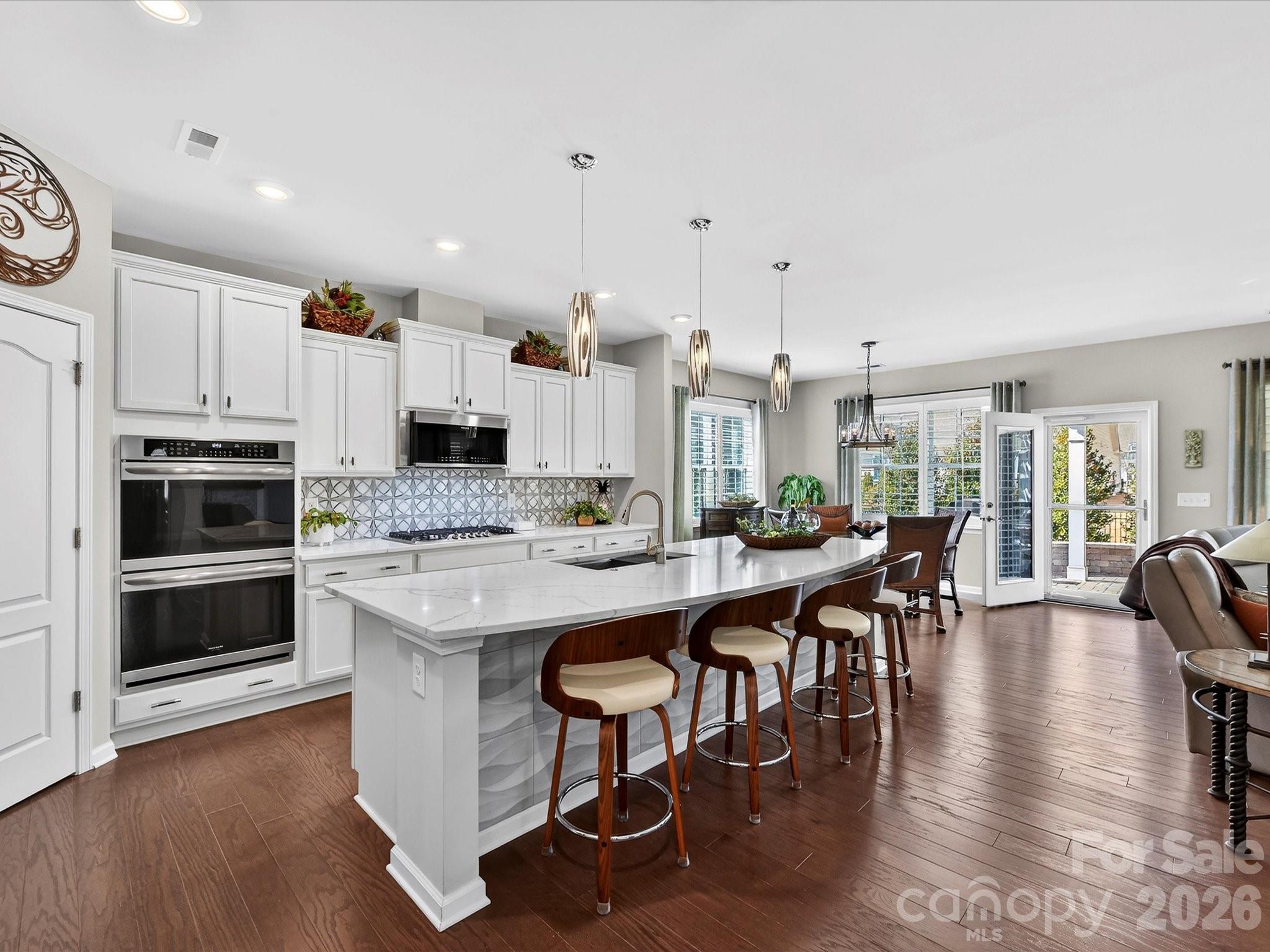 3355 Oliver Stanley Trail Lancaster, SC 29720 - Photo 13 of 48 a large kitchen with a table and chairs
