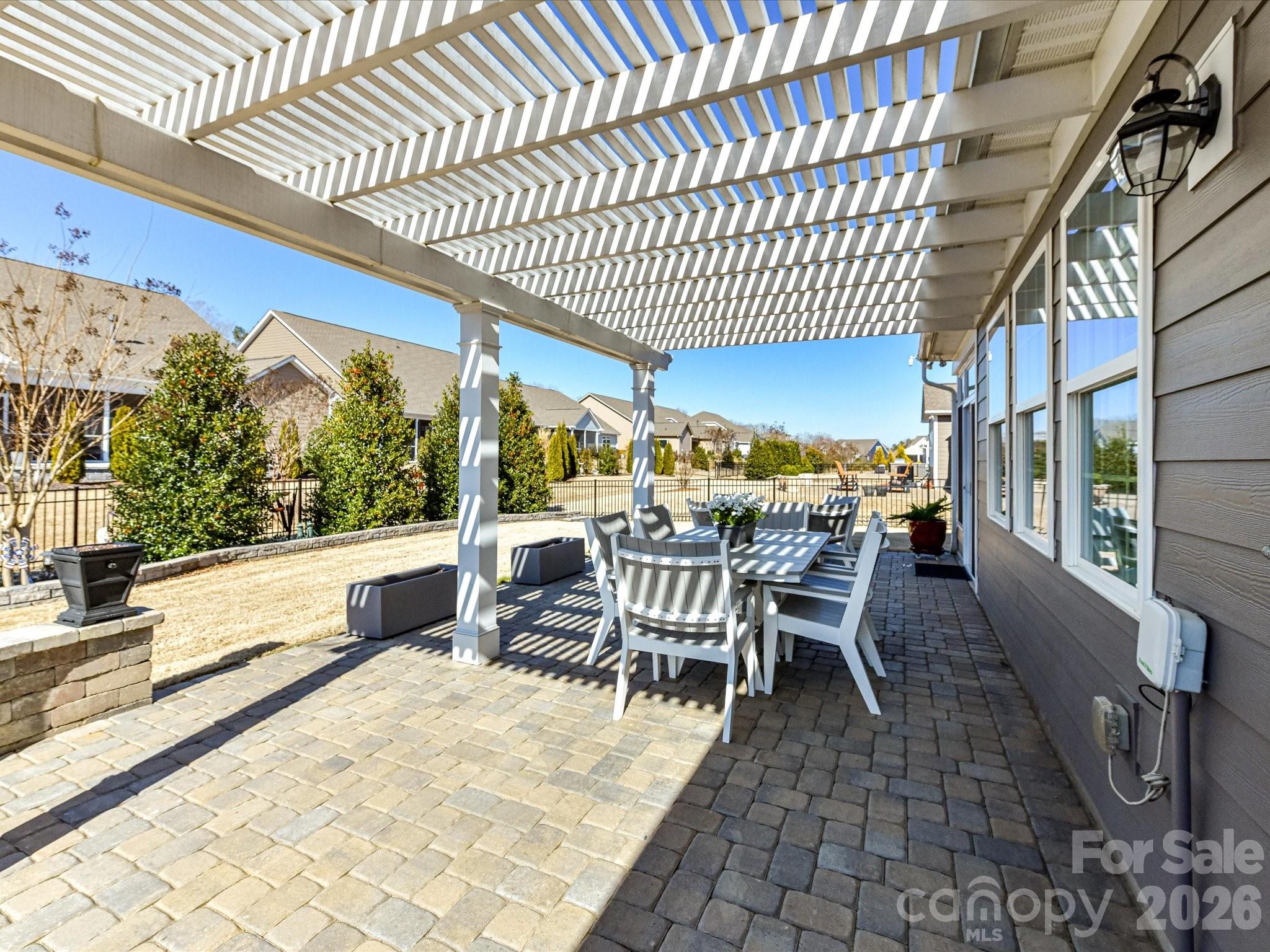 3355 Oliver Stanley Trail Lancaster, SC 29720 - Photo 35 of 48 a view of a patio with a table and chairs