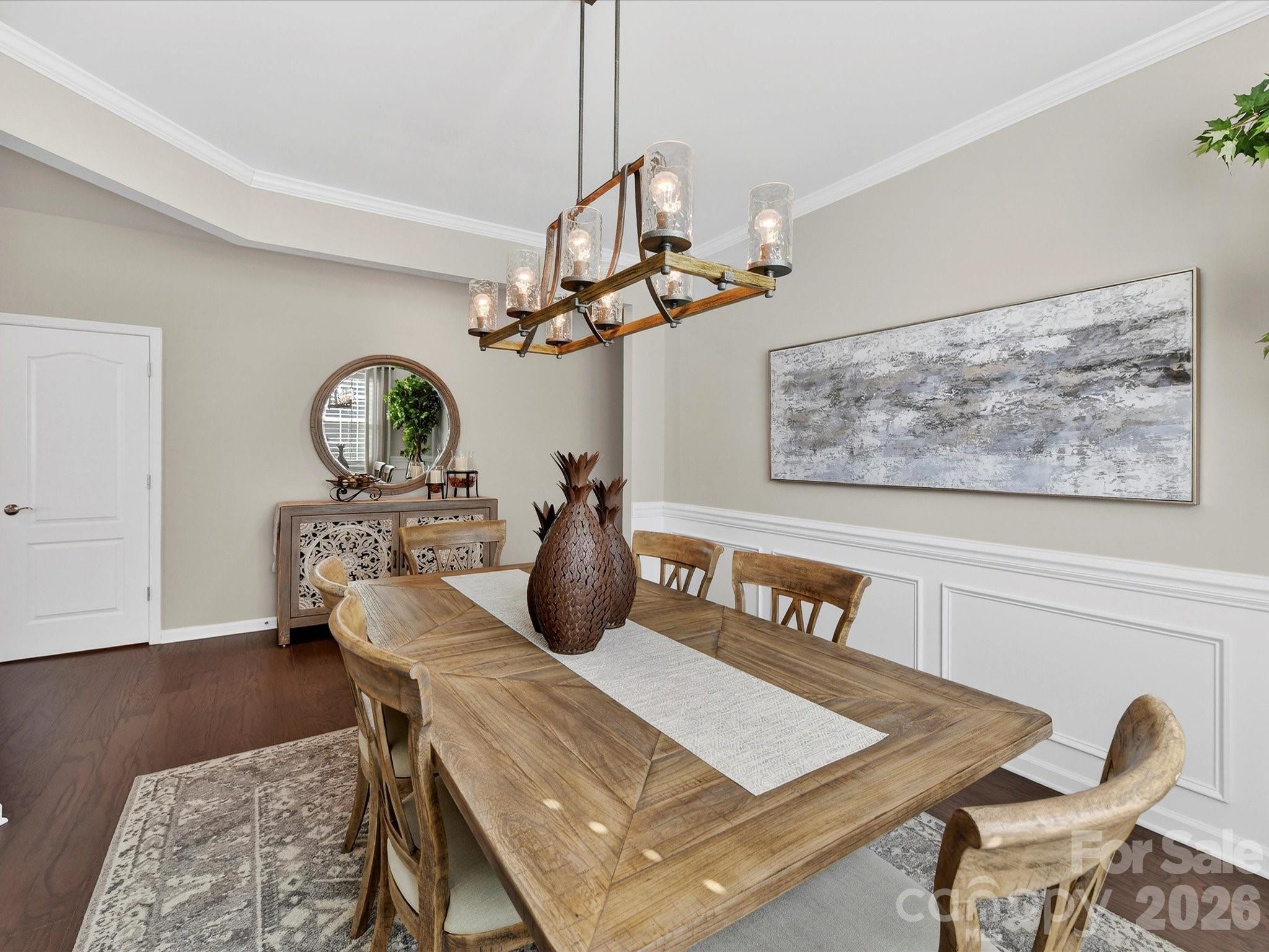3355 Oliver Stanley Trail Lancaster, SC 29720 - Photo 7 of 48 a view of a dining room with furniture and wooden floor