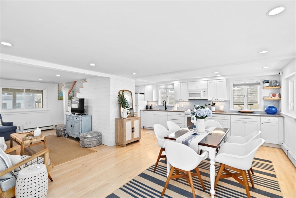 37 Rebecca Road Scituate, MA 02066 - Photo 13 of 18 a living room with furniture a dining table and kitchen view
