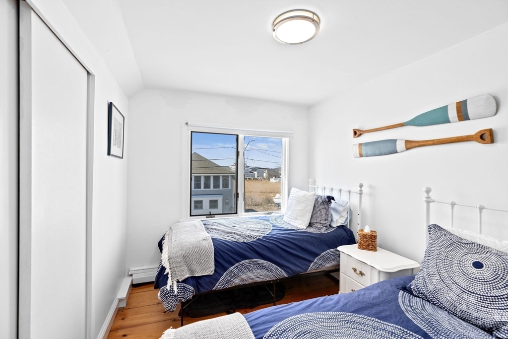 37 Rebecca Road Scituate, MA 02066 - Photo 15 of 18 a bedroom with furniture and a window