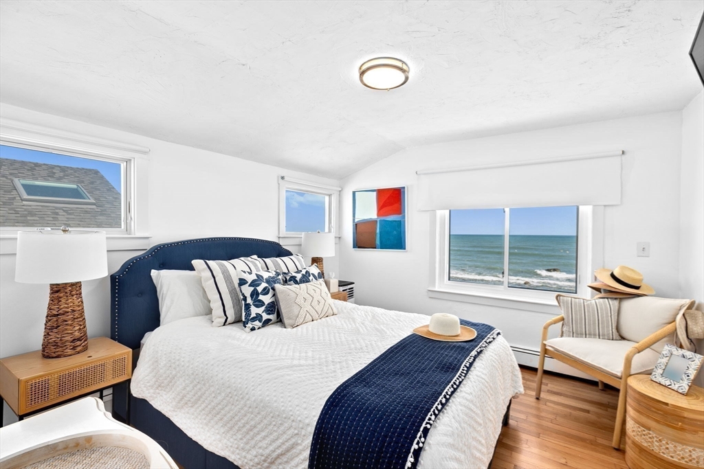 37 Rebecca Road Scituate, MA 02066 - Photo 16 of 18 a bedroom with a bed and wooden floor