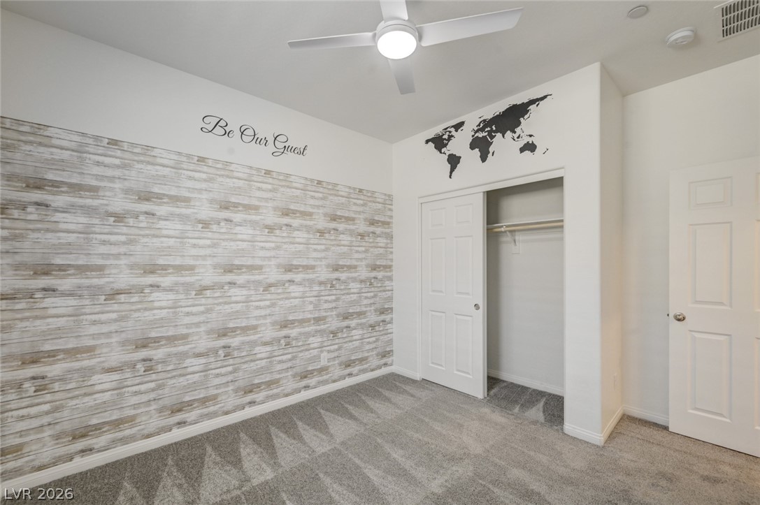 756 Cadence View Way Henderson, NV 89011 - Photo 20 of 45 Unfurnished bedroom featuring light colored carpet, a closet, and ceiling fan