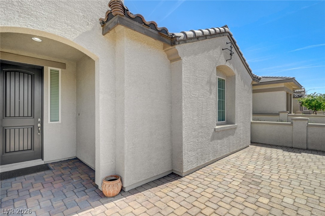 756 Cadence View Way Henderson, NV 89011 - Photo 4 of 45 Entrance to property featuring stucco siding and a tiled roof