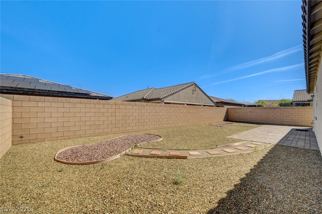 756 Cadence View Way Henderson, NV 89011 - Photo 41 of 45 Fenced backyard featuring a patio