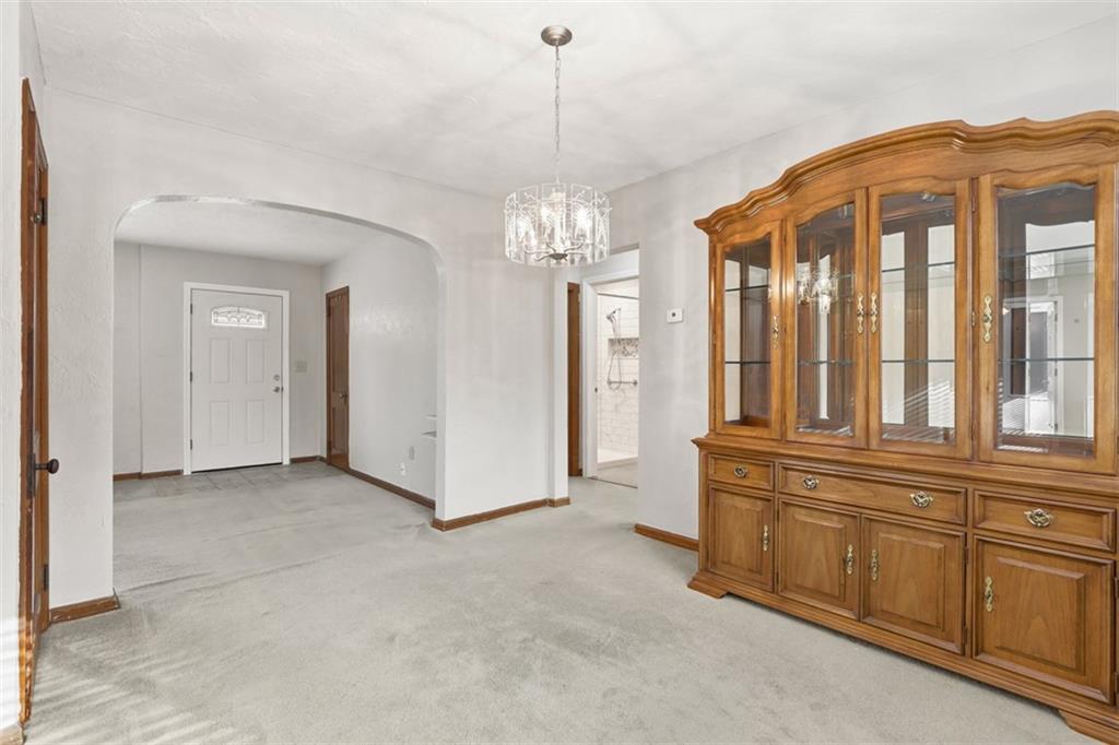 27 Ehle Avenue Coraopolis, PA 15108 - Photo 12 of 44 a view of a hallway with chandelier