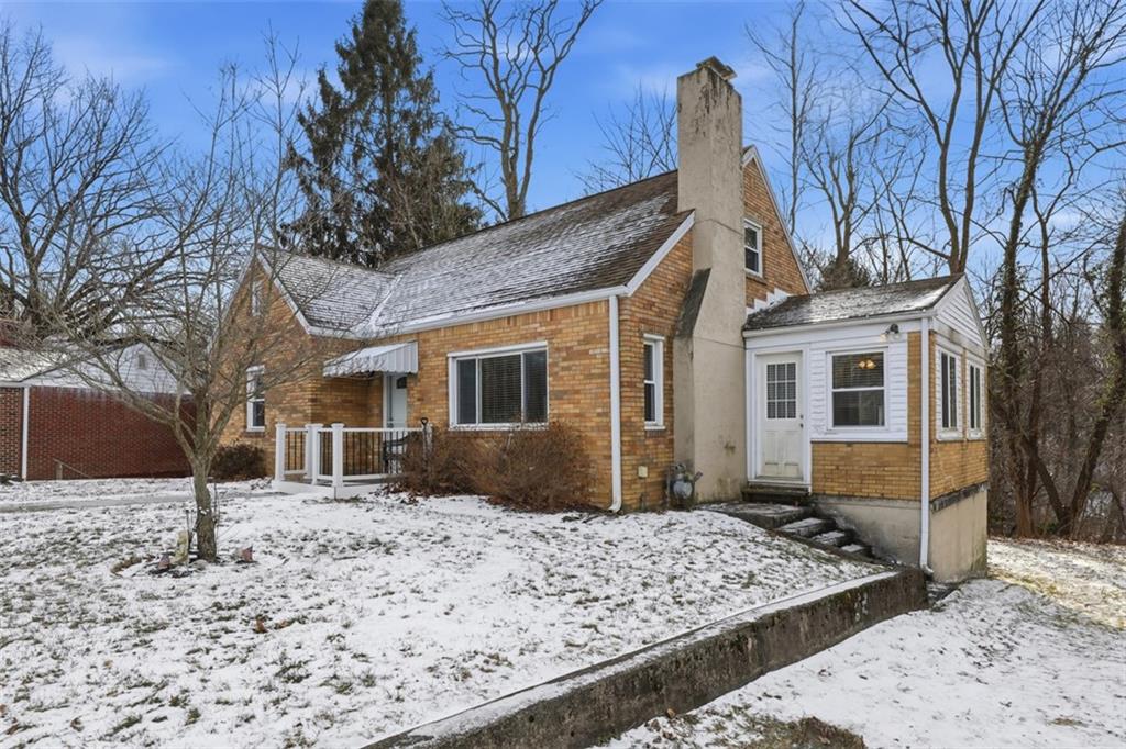 27 Ehle Avenue Coraopolis, PA 15108 - Photo 2 of 44 a front view of a house with a yard