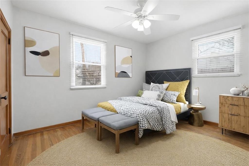 27 Ehle Avenue Coraopolis, PA 15108 - Photo 26 of 44 a bedroom with a bed and a chandelier