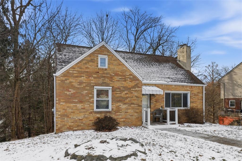 27 Ehle Avenue Coraopolis, PA 15108 - Photo 3 of 44 a front view of a house with a yard