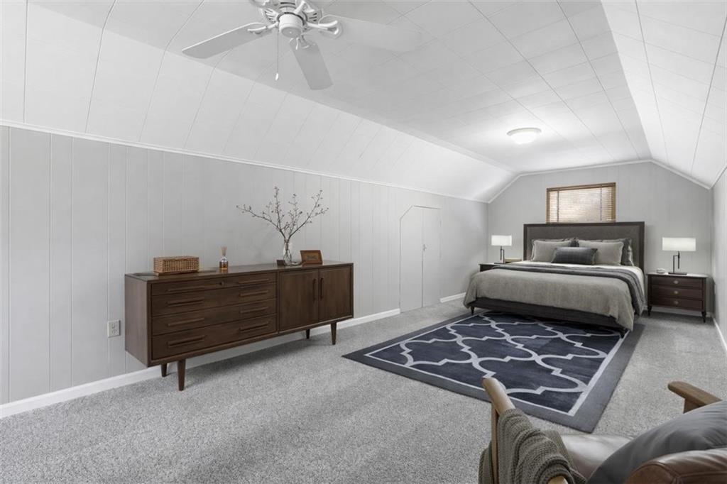 27 Ehle Avenue Coraopolis, PA 15108 - Photo 31 of 44 a bedroom with a bed and a chandelier