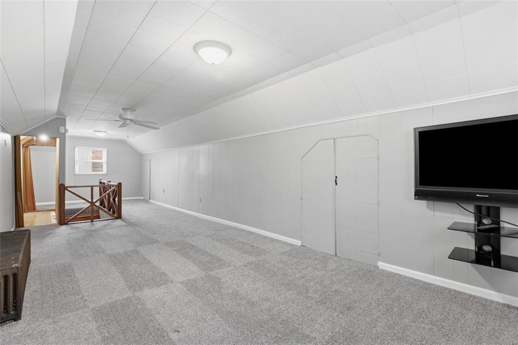 27 Ehle Avenue Coraopolis, PA 15108 - Photo 32 of 44 a living room with furniture and a flat screen tv