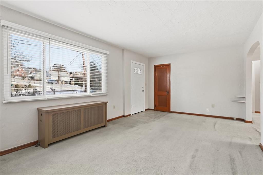 27 Ehle Avenue Coraopolis, PA 15108 - Photo 9 of 44 an empty room with windows