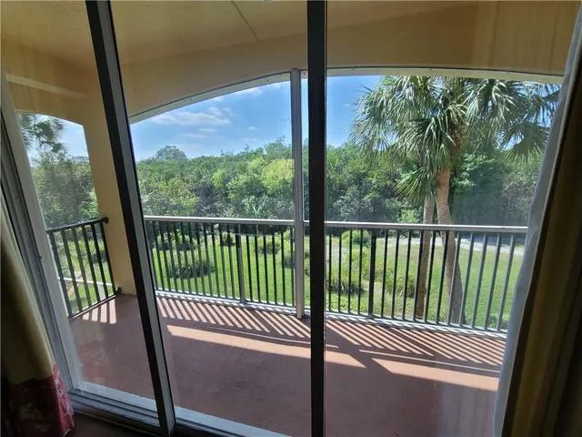 a view of a balcony with a porch