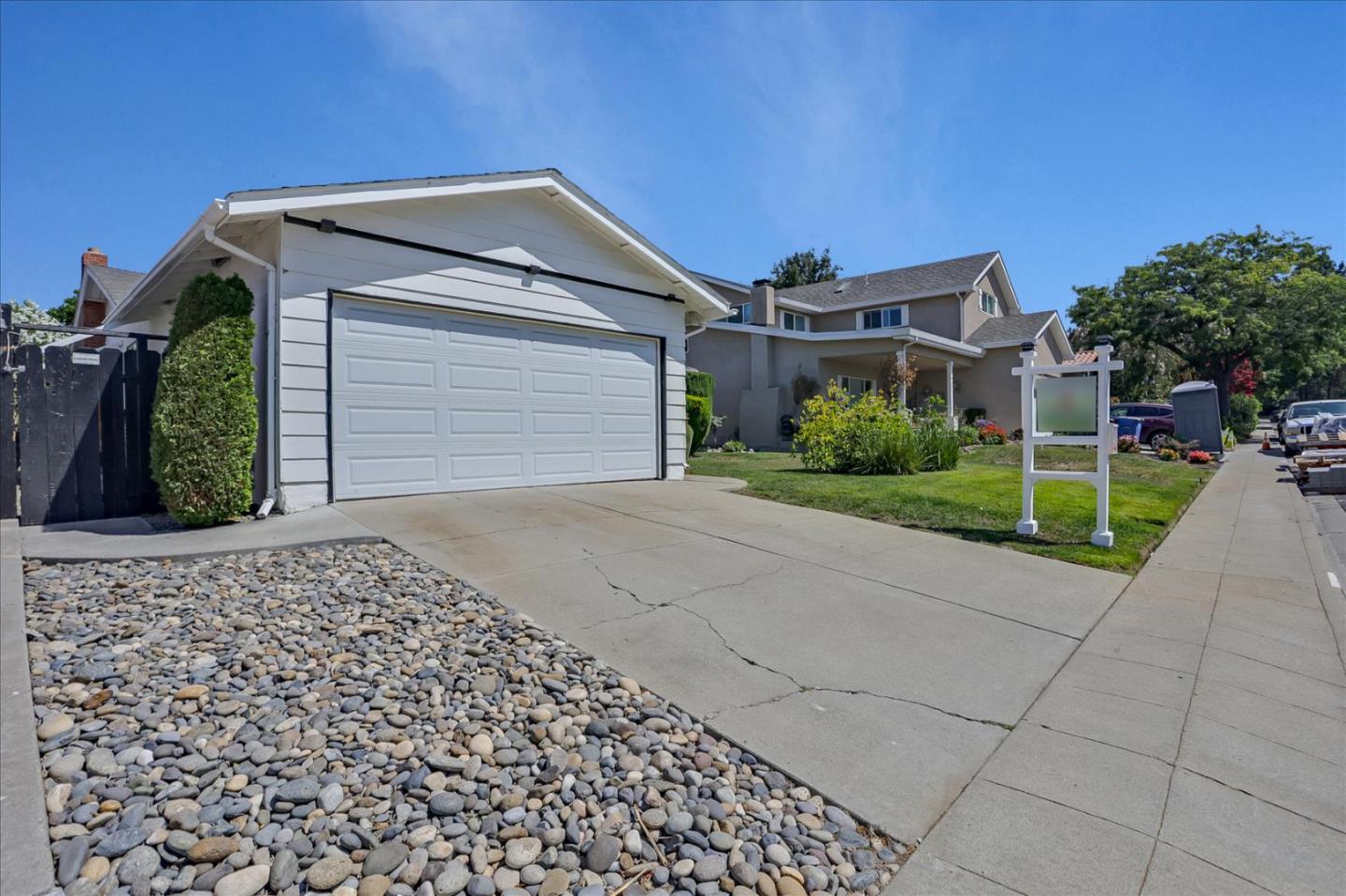 1865 Big Bend Drive Milpitas, CA 95035 - Photo 4 of 40 a front view of a house with a yard