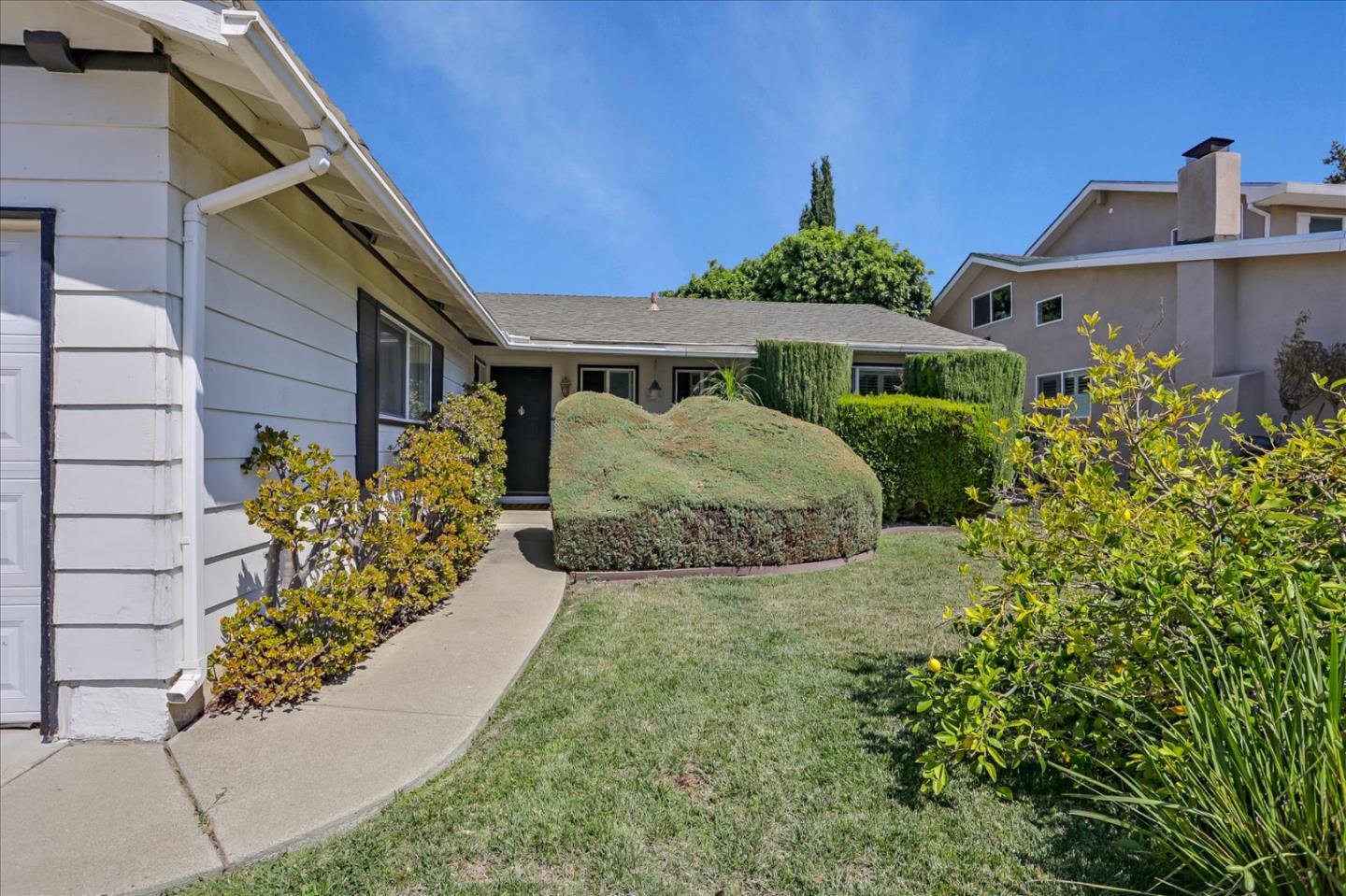 1865 Big Bend Drive Milpitas, CA 95035 - Photo 6 of 40 a front view of a house with a yard