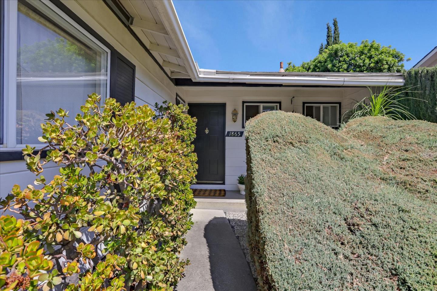 1865 Big Bend Drive Milpitas, CA 95035 - Photo 7 of 40 a front view of a house with a yard