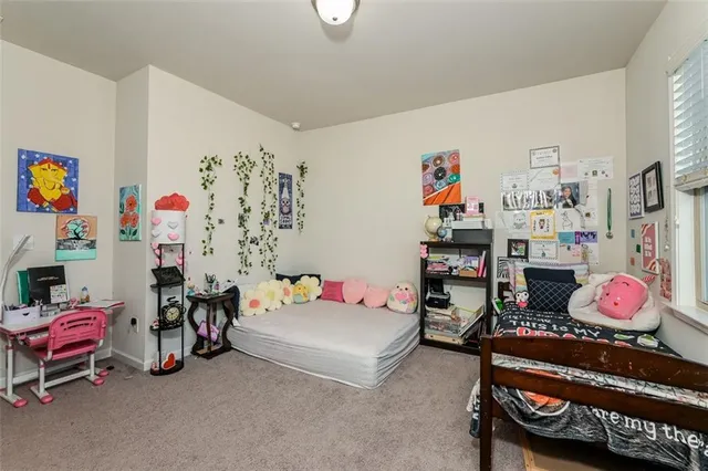 a bedroom with furniture and a bed