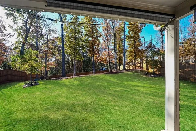 a view of a trees in front of a house