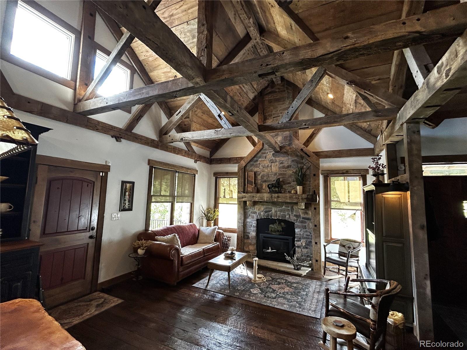 8238 Old San Isabel Road Rye, CO 81069 - Photo 6 of 31 a living room with furniture fireplace and flat screen tv