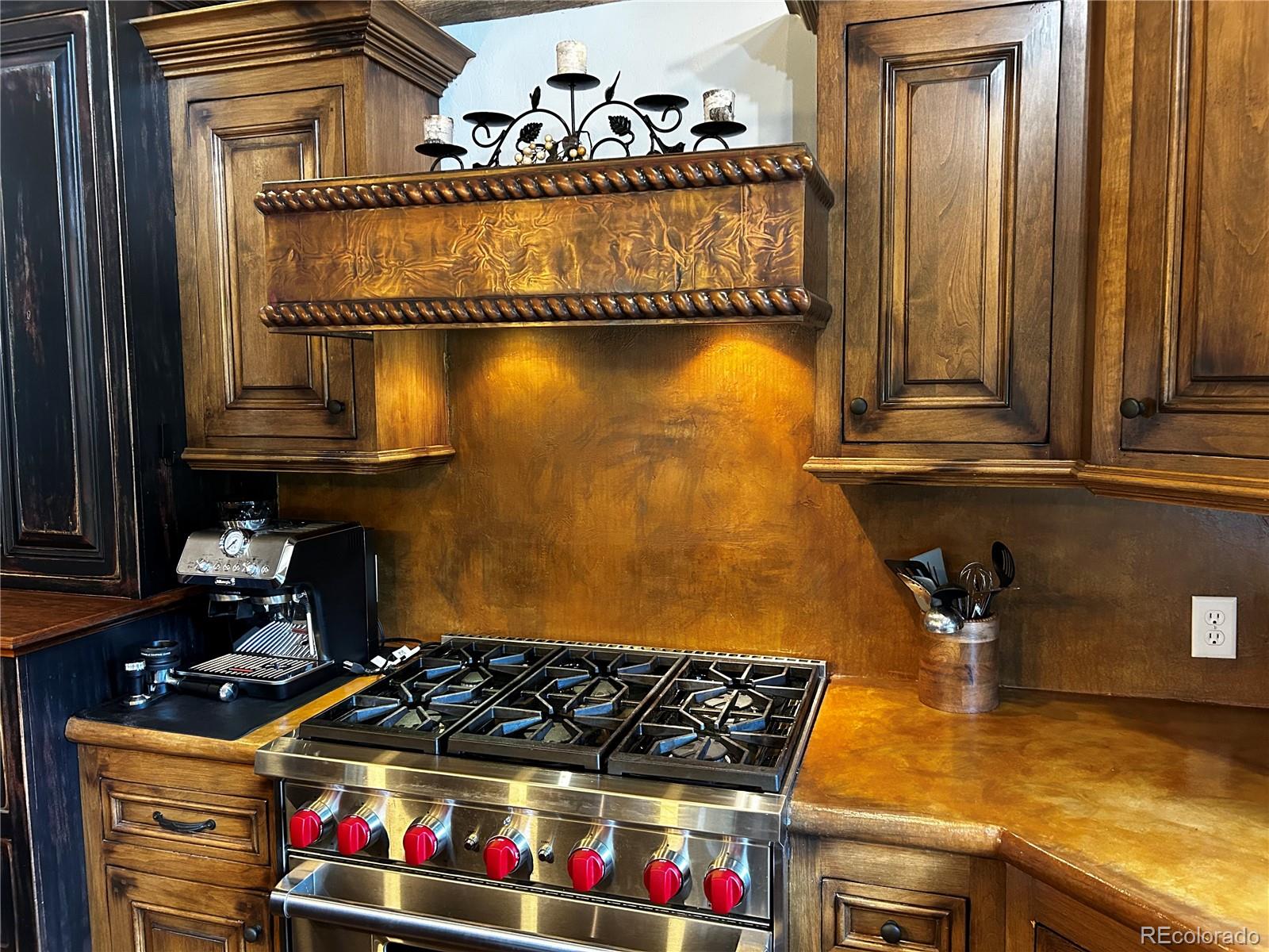 8238 Old San Isabel Road Rye, CO 81069 - Photo 10 of 31 a kitchen with a stove and cabinets