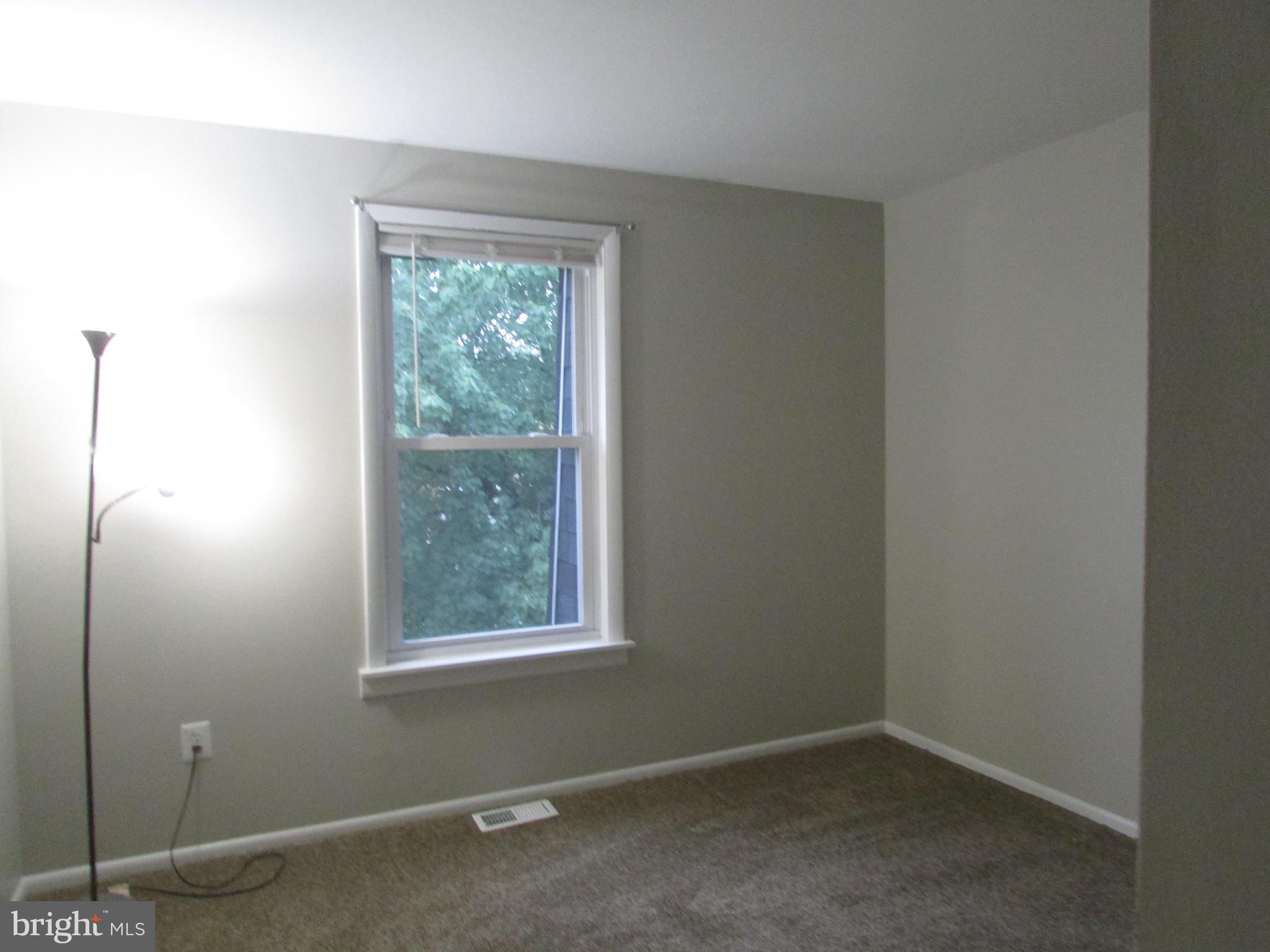 1027 Harbour Drive Palmyra, NJ 08065 - Photo 11 of 16 an empty room with windows