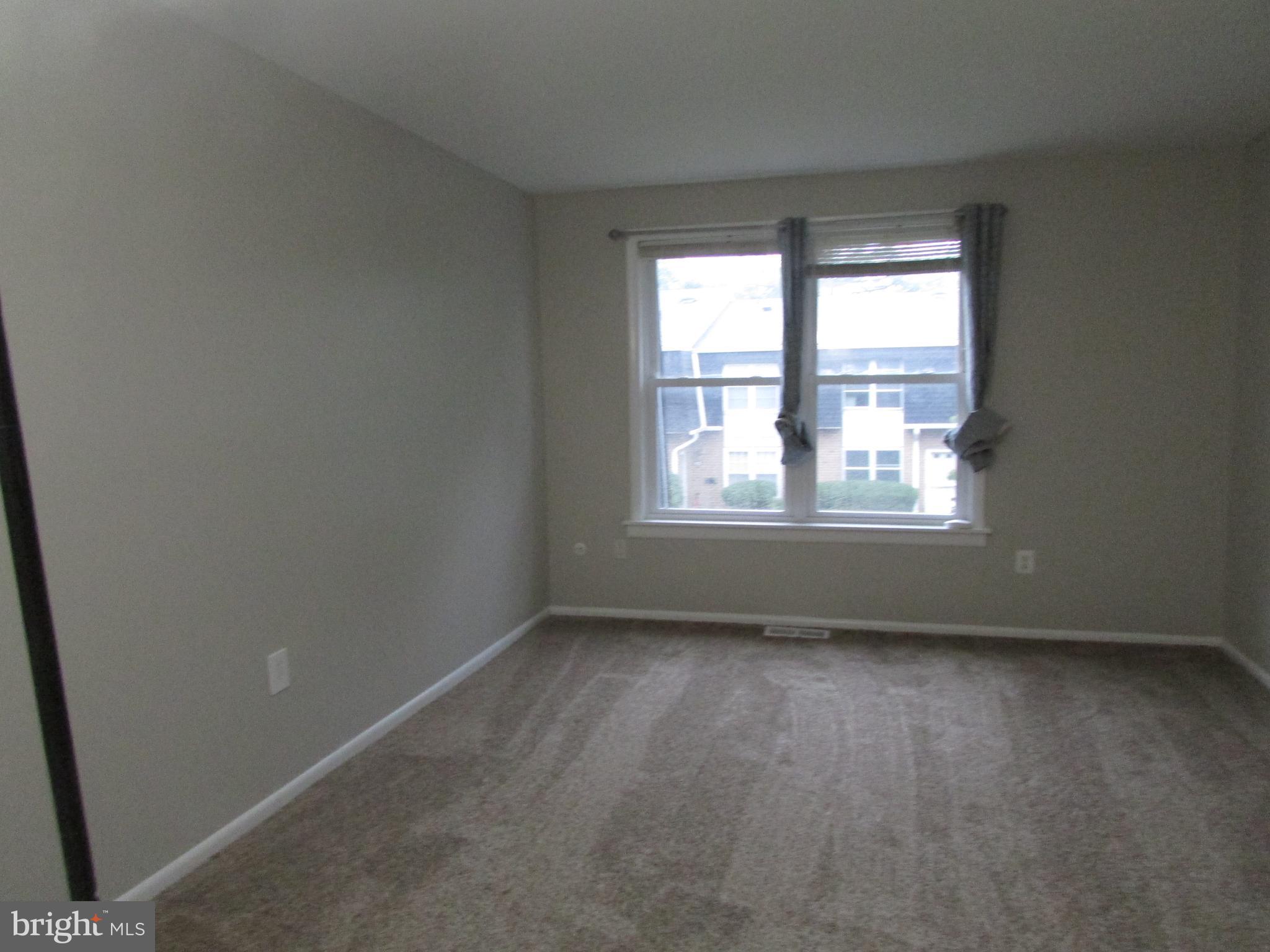 1027 Harbour Drive Palmyra, NJ 08065 - Photo 13 of 16 an empty room with a window