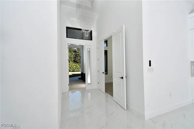 a view of a livingroom with a hallway