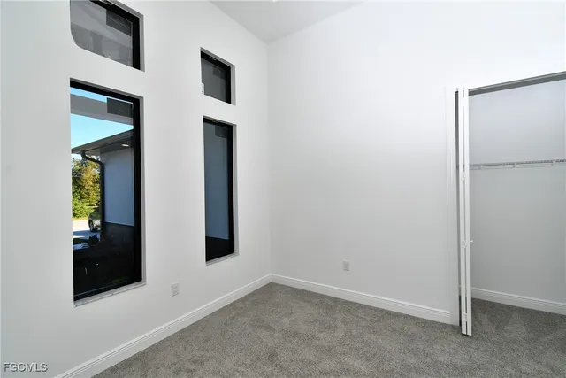 an empty room with windows