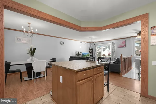 a view of a kitchen and dining room