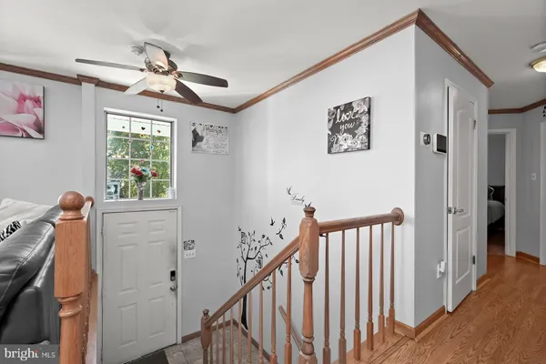 a view of entryway with wooden floor