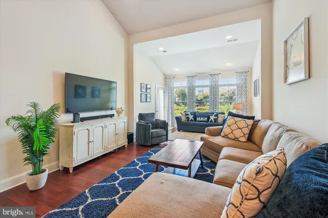 a bedroom with a bed and flat screen tv