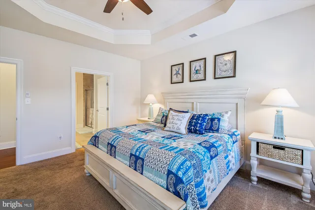 a en suite bathroom with a toilet sink and mirror