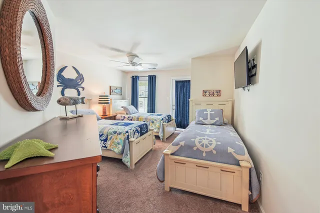 front view of a brick house with a yard