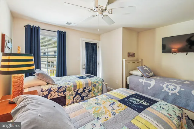 a view of swimming pool with outdoor seating and city view